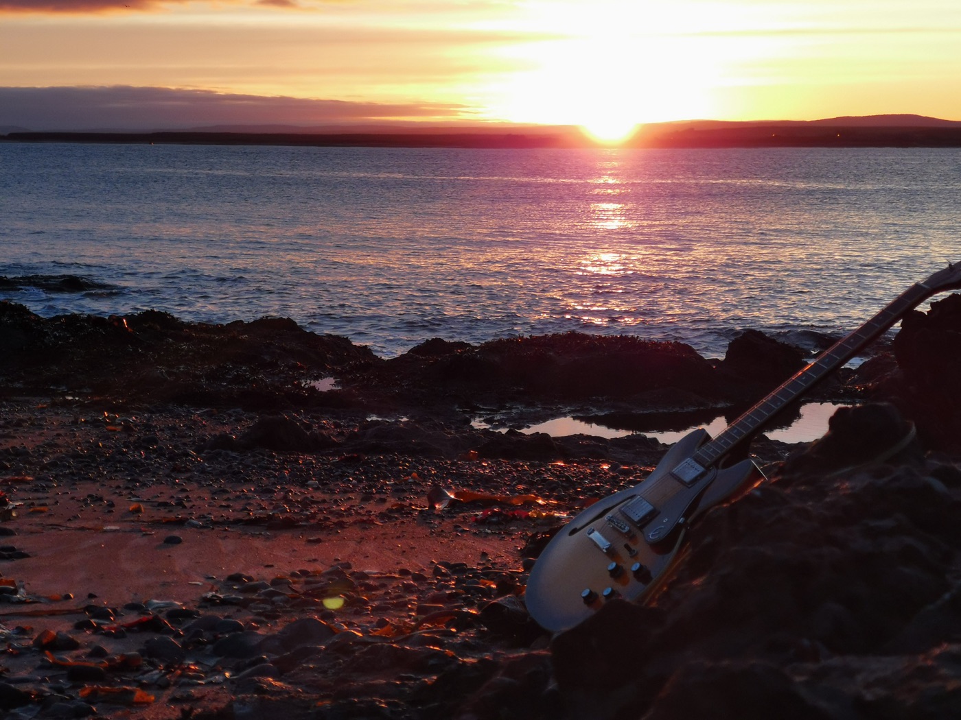 Guitar by the coast